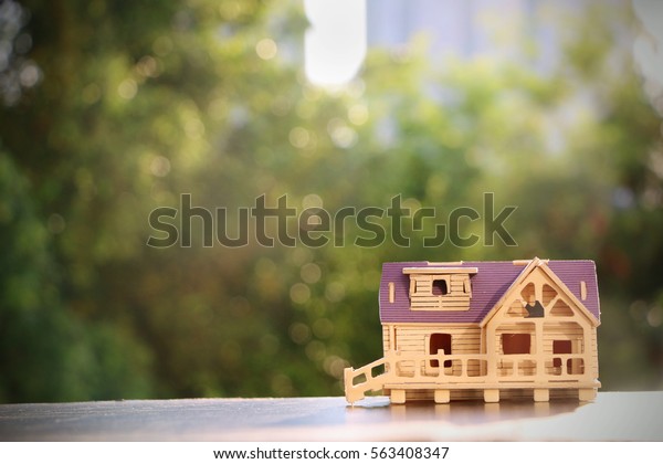 Model home with bokeh\
background