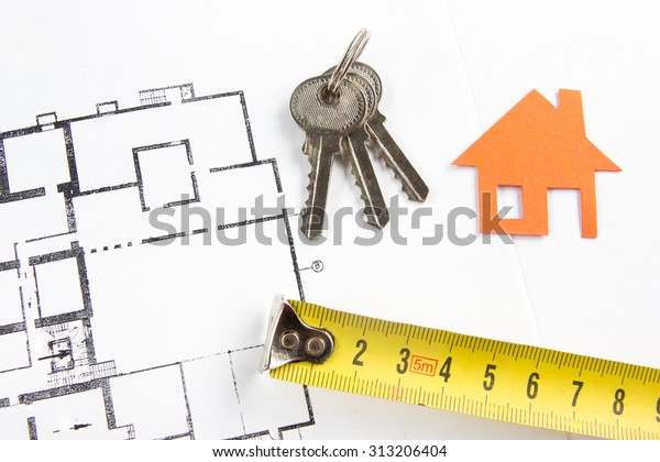 Model\
house, construction plan for house building, keys, divider compass\
and clipboard. Real Estate Concept. Top\
view.