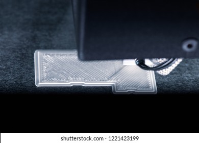Model of a house is created in 3D printer, concept future in architecture or construction such as building construction