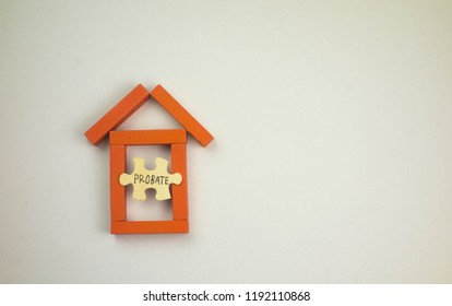 Model  House Made From Wooden Block And Wooden Puzzle With Text Probate On White Background. Property And Mortgage Concept.