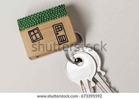 Model house with set of home keys. Housing concept