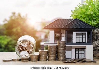 Model House With Your Deposit Money.Real Estate And Mortgage Investment Concept.