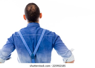 model isolated on plain background back hands on hips