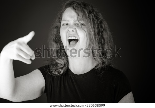 model isolated on plain background nagging\
scolding with finger