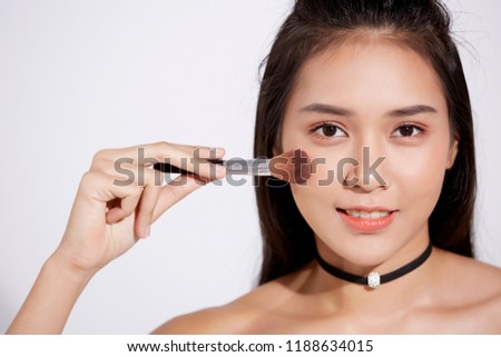 Model with makeup in photo studio