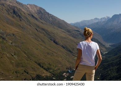 model at the mountains at the summer 