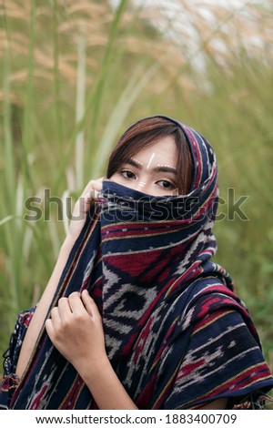 Model photos in the grass with Indian concepts