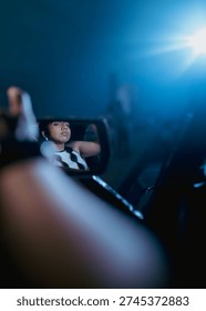 model posing from inside a car