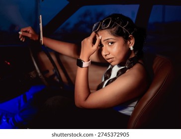 model posing from inside a car