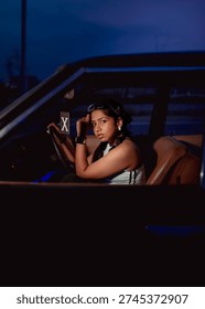 model posing from inside a car