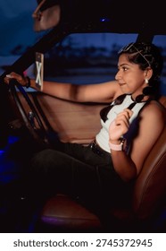model posing from inside a car