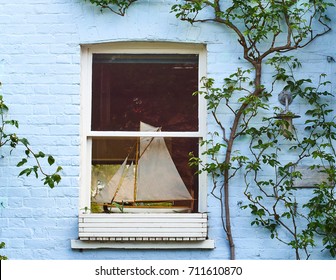 A model ship in the window
