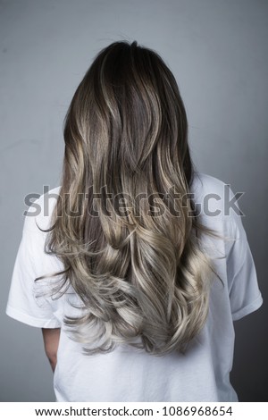 Model showing her Grey colored hair, back view Stock photo © 