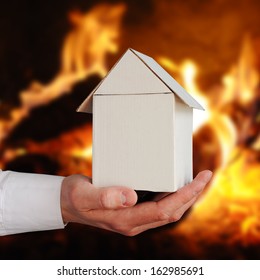 Model Of Small House In Front The Fire