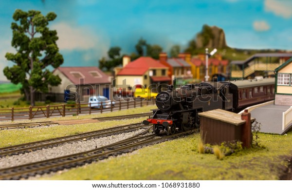 Model steam train at\
railway station