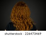 Model in studio isolated on plain grey background