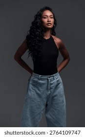 Model tests, model poses in studio against simple background.