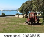 model train engine in park by harbour