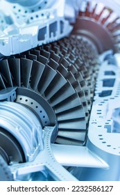 Model of turbine engine with longitudinal section for studying arrangement of blades and combustion chambers