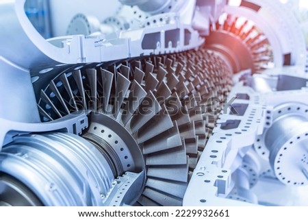 Model of turbine engine with longitudinal section for studying arrangement of blades and combustion chambers