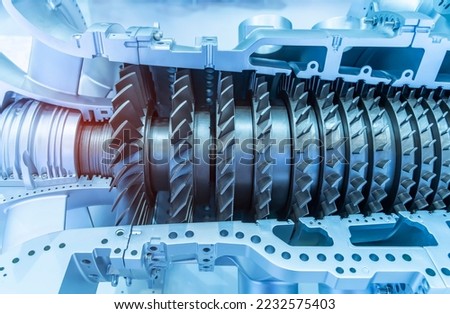 Model of turbine engine with longitudinal section for studying arrangement of blades and combustion chambers