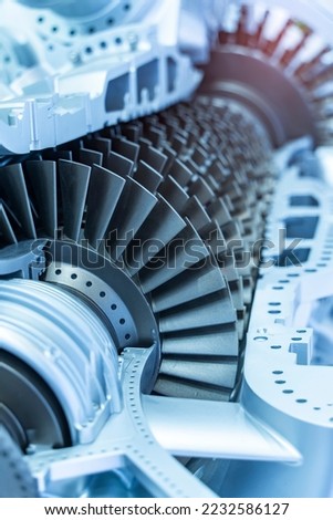 Model of turbine engine with longitudinal section for studying arrangement of blades and combustion chambers