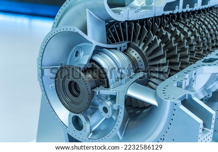 Model of turbine engine with longitudinal section for studying arrangement of blades and combustion chambers
