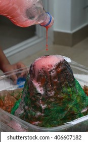 Model Of Volcano, Science Fair Project/ School Science Project, Kids Presenting Their Science Home Project At School. Volcanic Mountain Eruption Molten Lava, Prepared For Education Purpose For Kids