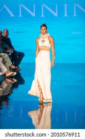 A model walks the runway for Designer Giannina Azar Fashion Show during Art, Hearts, Fashion Swim Week  at the Faena Forum in Miami Beach on 
 7- 8- 2021