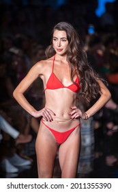 A model walks the runway for Designer Kino Swim Fashion Show during Art, Hearts, Fashion Swim Week  at the Faena Forum in Miami Beach on 
 7- 8- 2021