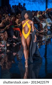 A model walks the runway for Designer Kino Swim Fashion Show during Art, Hearts, Fashion Swim Week  at the Faena Forum in Miami Beach on 
 7- 8- 2021