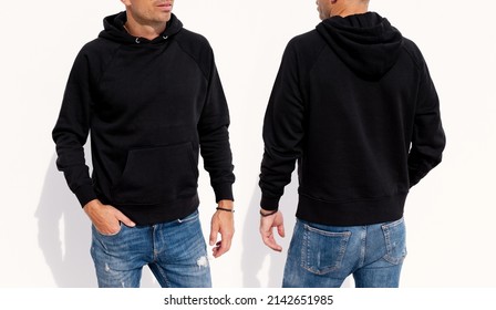 Model wearing black men's hoodie, mockup for your own design