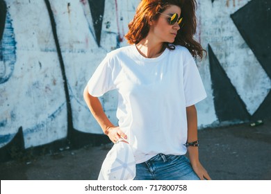 Model Wearing Plain White Tshirt And Hipster Sunglasses Posing Against Street Wall, Teen Urban Clothing Style