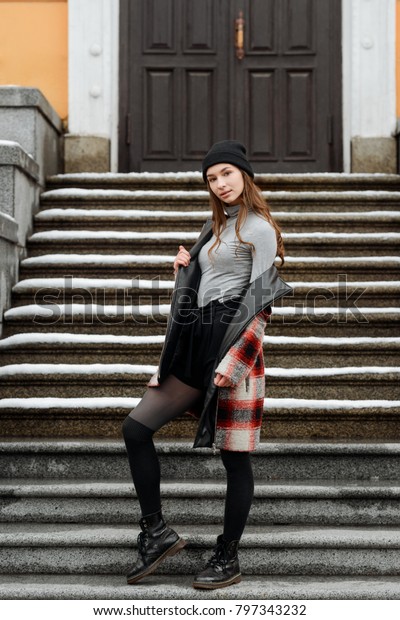 half wearing jacket