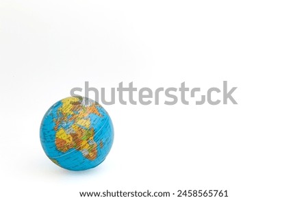 Model of the world lying on its side, globe or Earth isolated on a white background. Africa, Europe, India, Turkey, Iran, Iraq. Horizontal. For text.