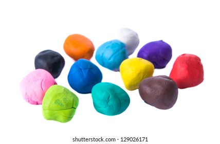 A Modelling Clay Ball Of Different Colors Isolated On A White Background