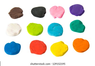 A Modelling Clay Ball Of Different Colors Isolated On A White Background