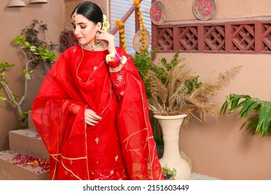 Models Posing Festive Fashion Shoot On Location Wearing Asian Pakistani Indian Traditional Dresses
Karachi Sindh Pakistan
 March 24 2022