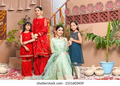Models posing festive fashion shoot on location wearing asian pakistani indian traditional dresses
Karachi Sindh Pakistan
 March 24 2022