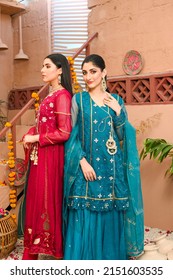 Models Posing Festive Fashion Shoot On Location Wearing Asian Pakistani Indian Traditional Dresses
Karachi Sindh Pakistan
 March 24 2022