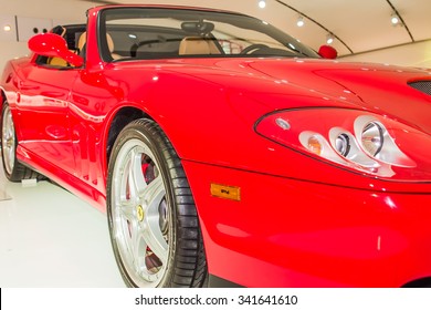 MODENA, ITALY - APRIL 2015: Museum  Enzo Ferrari Modena. Red Ferrari 575 Superamerica 2005. Side View. Front Wheel.