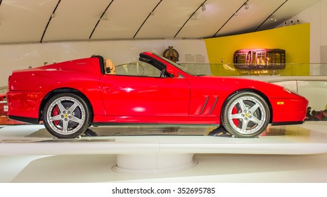 MODENA, ITALY - APRIL 2015: Museum Enzo Ferrari Modena. Red Ferrari 575 Superamerica 2005. Side View.