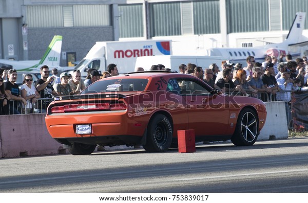 a moder charger muscle car at\
a motor show in italy. rivanazzano terme-italy 15 october\
2017