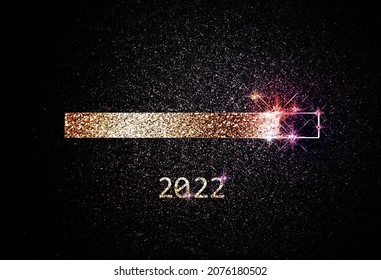 Modern 2022 New Year graphic design template with golden loading bar and glimmering particles on black background - Shutterstock ID 2076180502