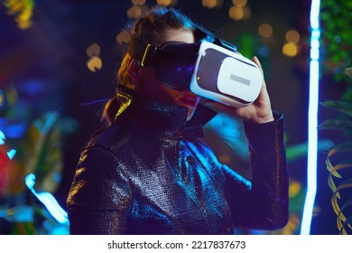 Modern 40 Years Old Woman In Metaverse In Vr Headset.