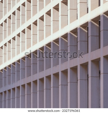Modern abstract architecture. Detail of some collumns on the facade of a government building.