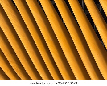 Modern Abstract Wooden Architectural Pattern Background. A close-up view of a modern architectural design wooden slats arranged in a dynamic, diagonal pattern natural texture and contemporary style. - Powered by Shutterstock