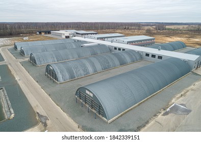 the modern agricultural sector. Top view, autumn. Metal hangars-vegetable stores - Powered by Shutterstock