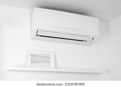 Modern air conditioner for cooling or heating home.