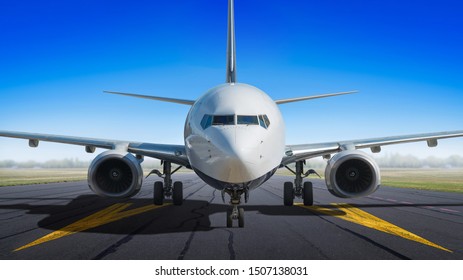 Modern Aircraft On A Runway Ready For Take Off